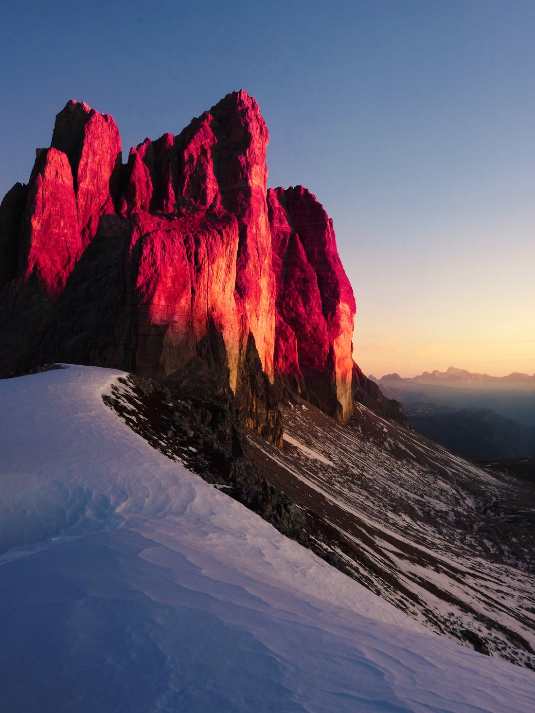 Dolomite spires glowing at dawn over Alta Badia
