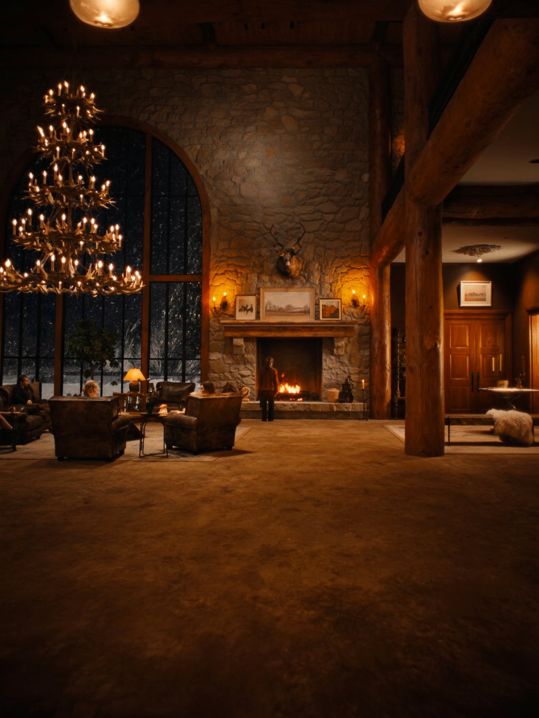 A timber-and-stone Montana lodge by firelight