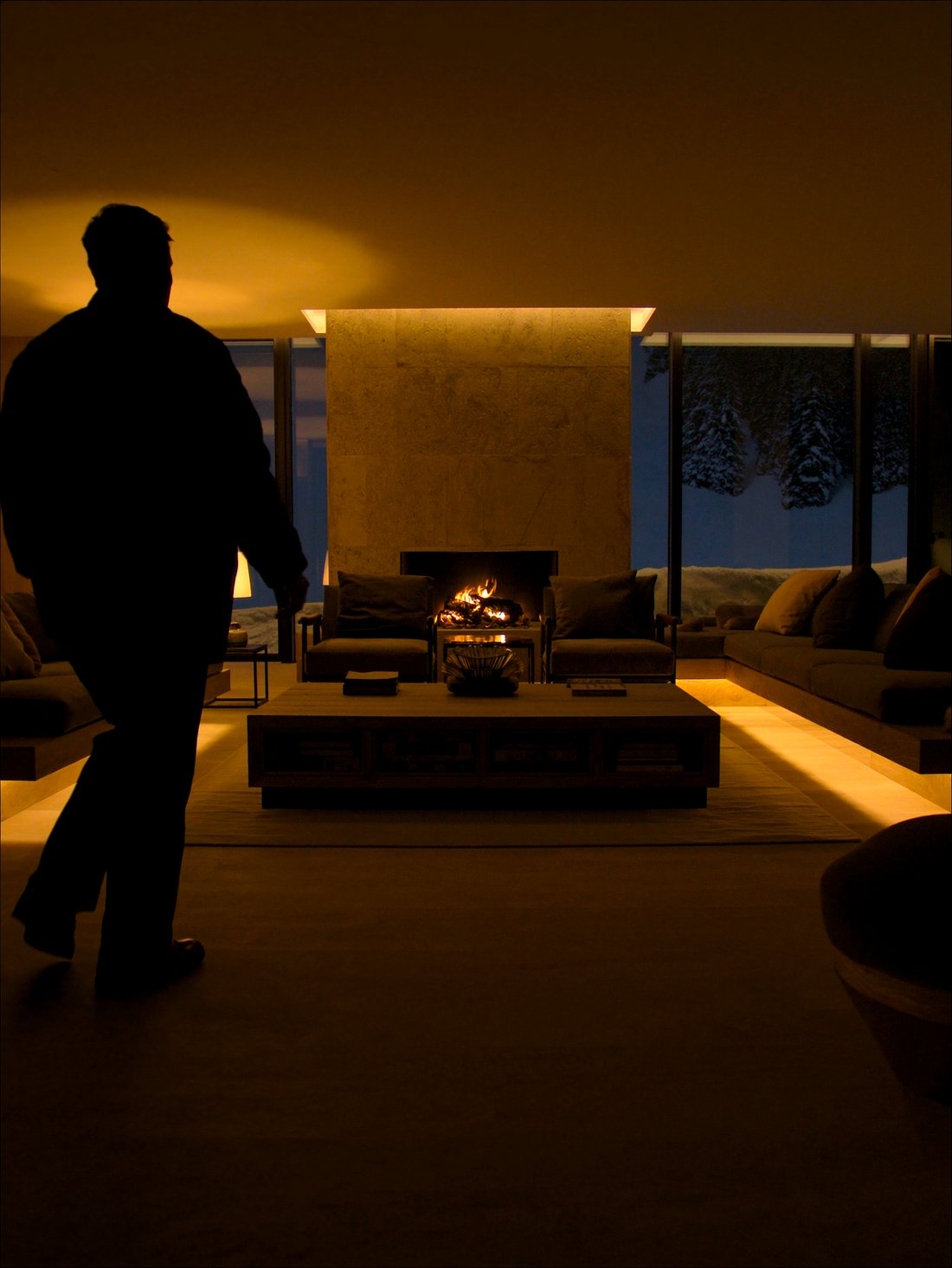 A designer ski chalet interior at night