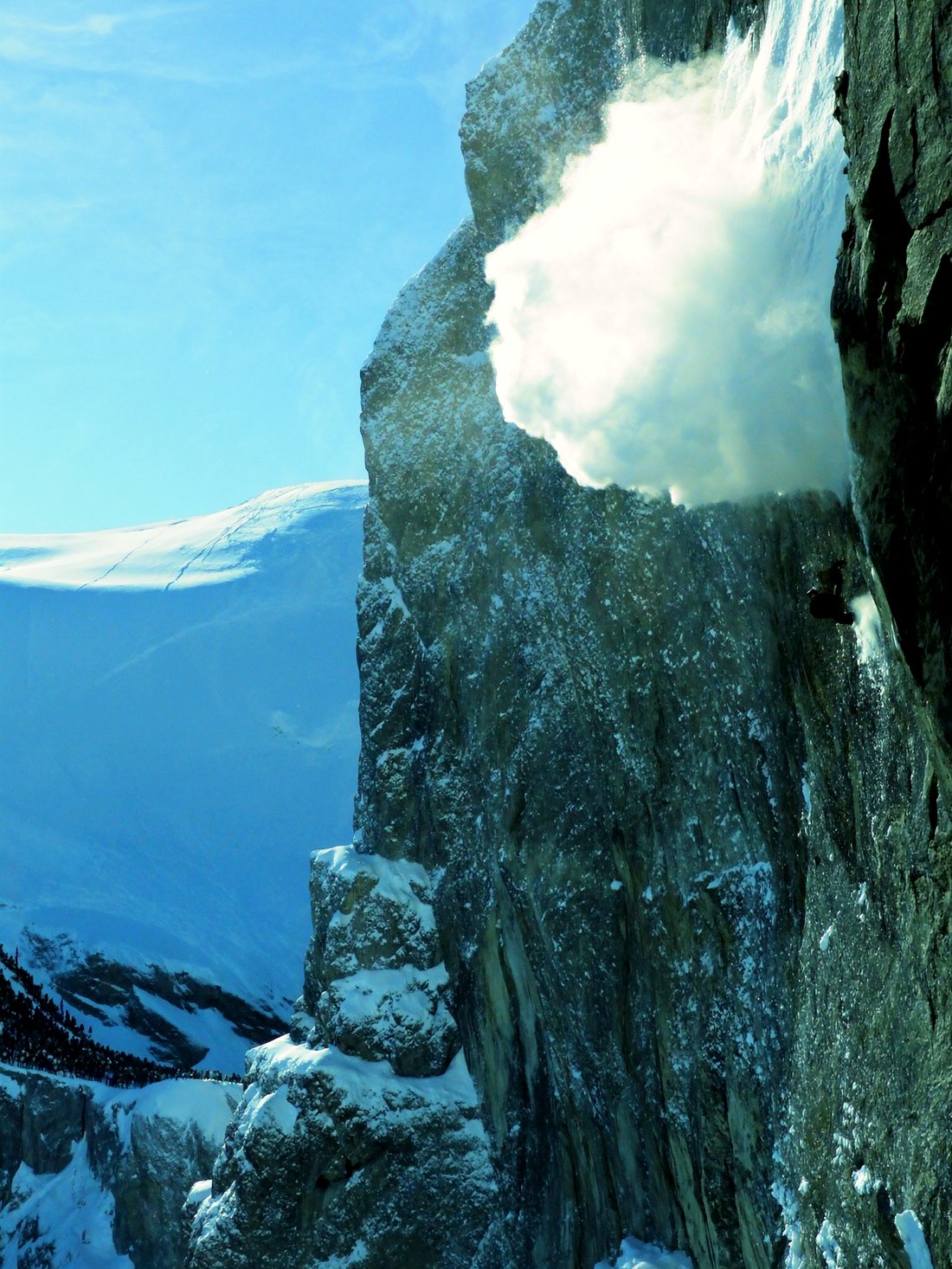 A freerider dropping a steep off-piste line at Verbier