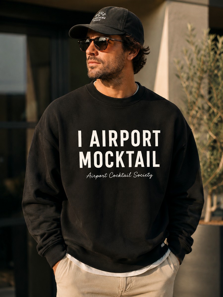 A model wearing the black I Airport Mocktail crewneck