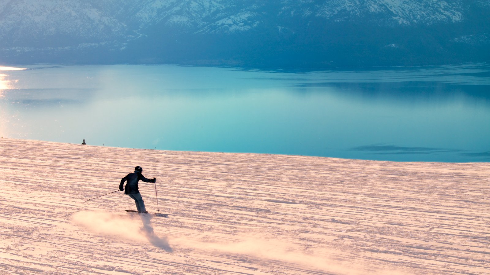 Skiing high above the blue of Lake Tahoe