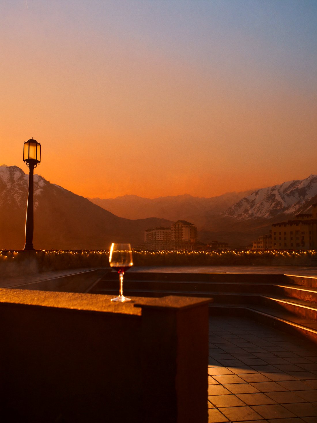 A slope-side Valle Nevado hotel terrace at sunset