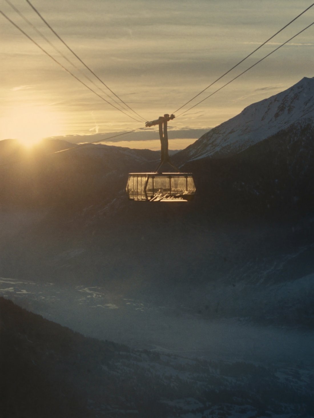 The Peak 2 Peak glass-floor gondola high over the valley