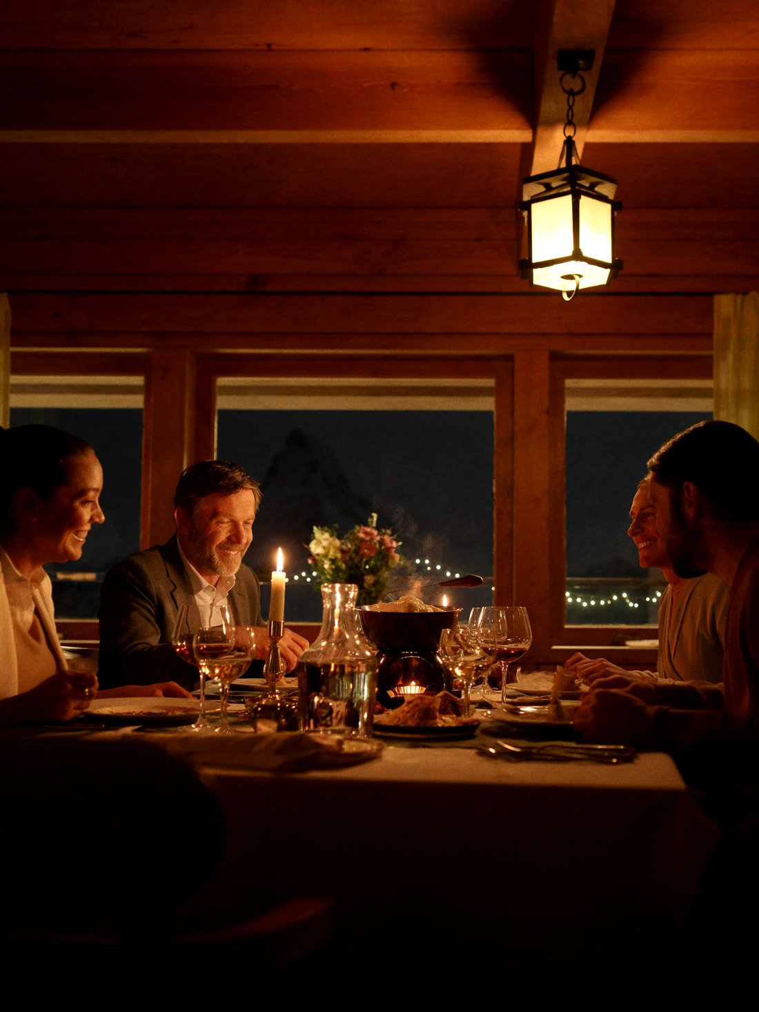 A candlelit chalet fondue dinner